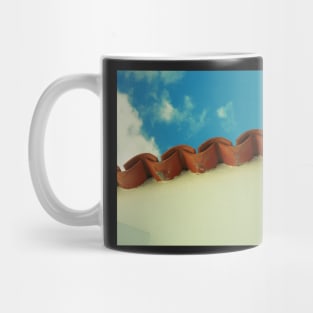 Red tiles with sky blue background Mug